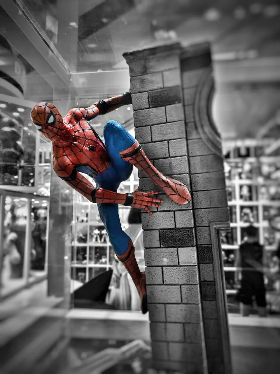 Spider-Man Figure Climbing Wall in Selective Color