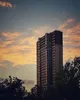Sunset Glow on a Riverside Tower
