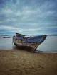 Weathered Boat on a Quiet Shore