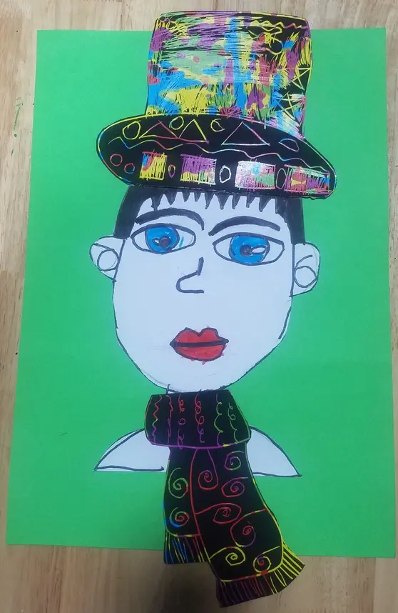 Colorful paper portrait with patterned hat and scarf